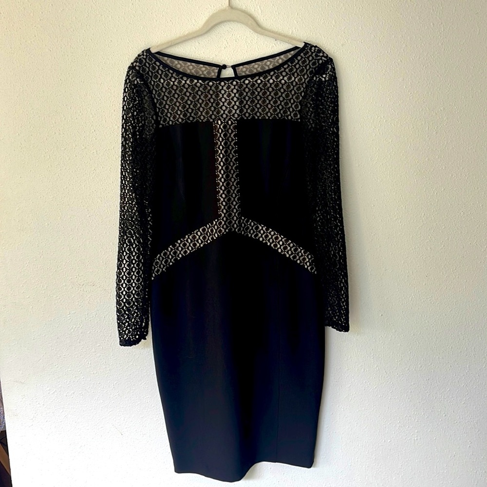 An absolutely stunning black Maggy London dress!
